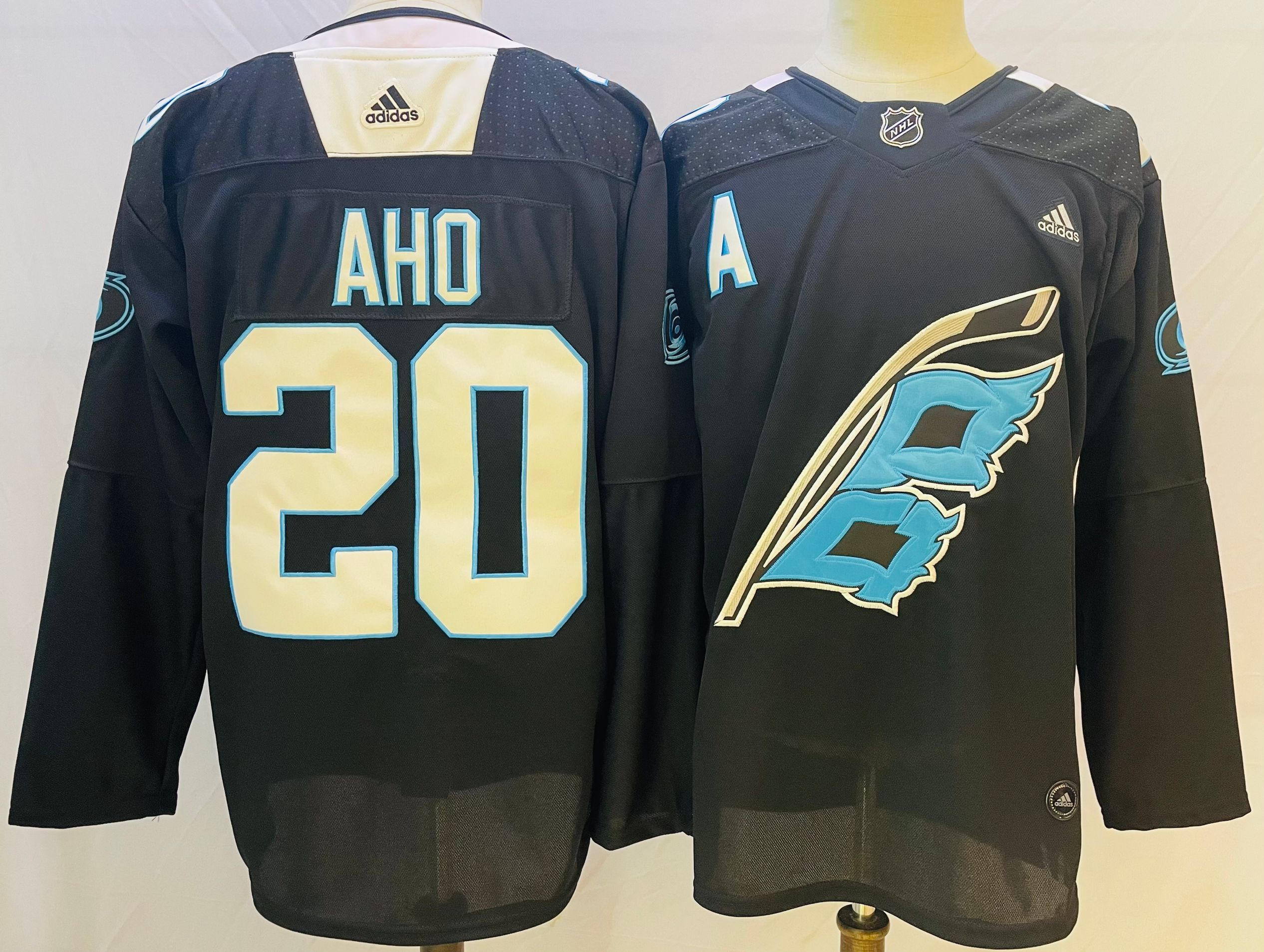 Men Carolina Hurricanes #20 Aho Black Authentic Stitched 2022 Adidas NHL Jersey->toronto maple leafs->NHL Jersey